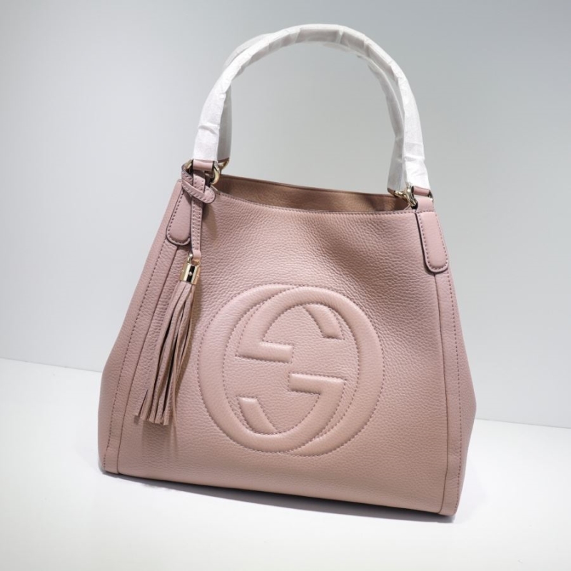 G*u*i shopping bags